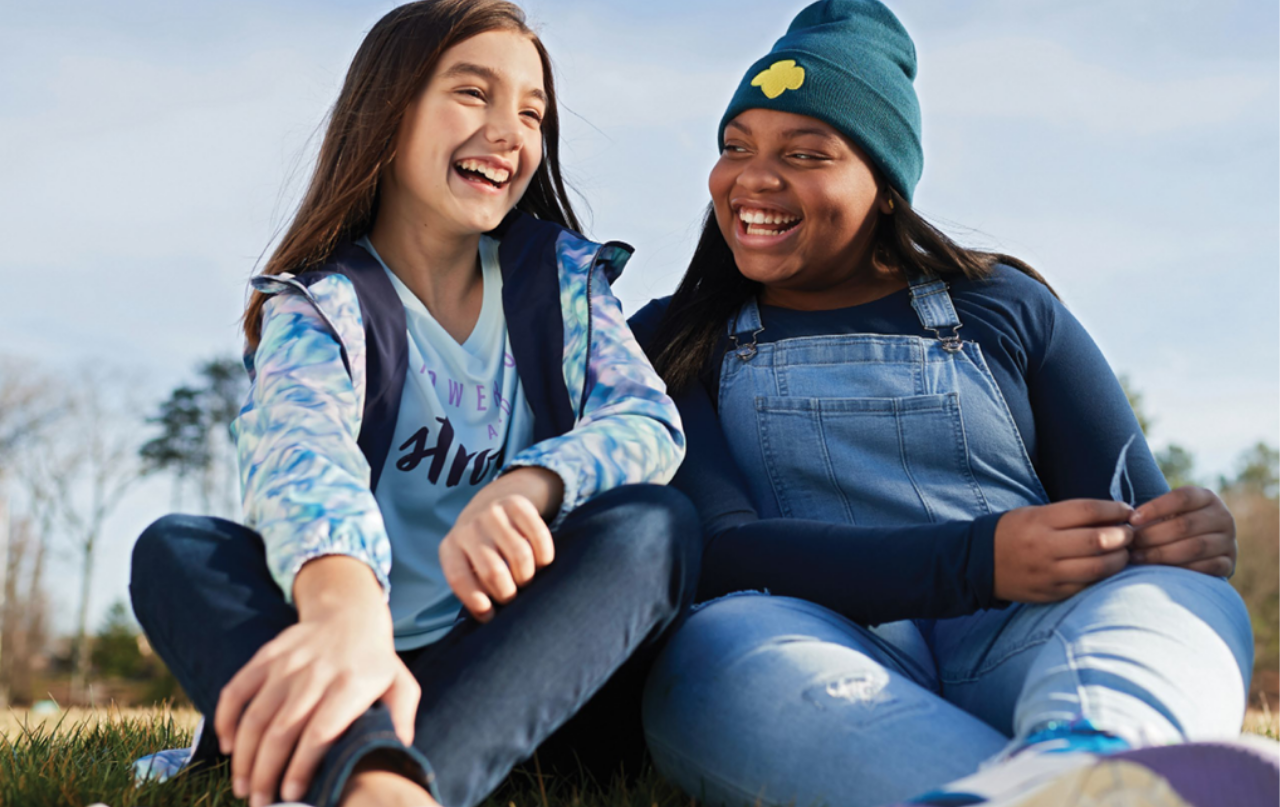 Two Girl Scouts on the cover of the California 2026 State of the Girl Report