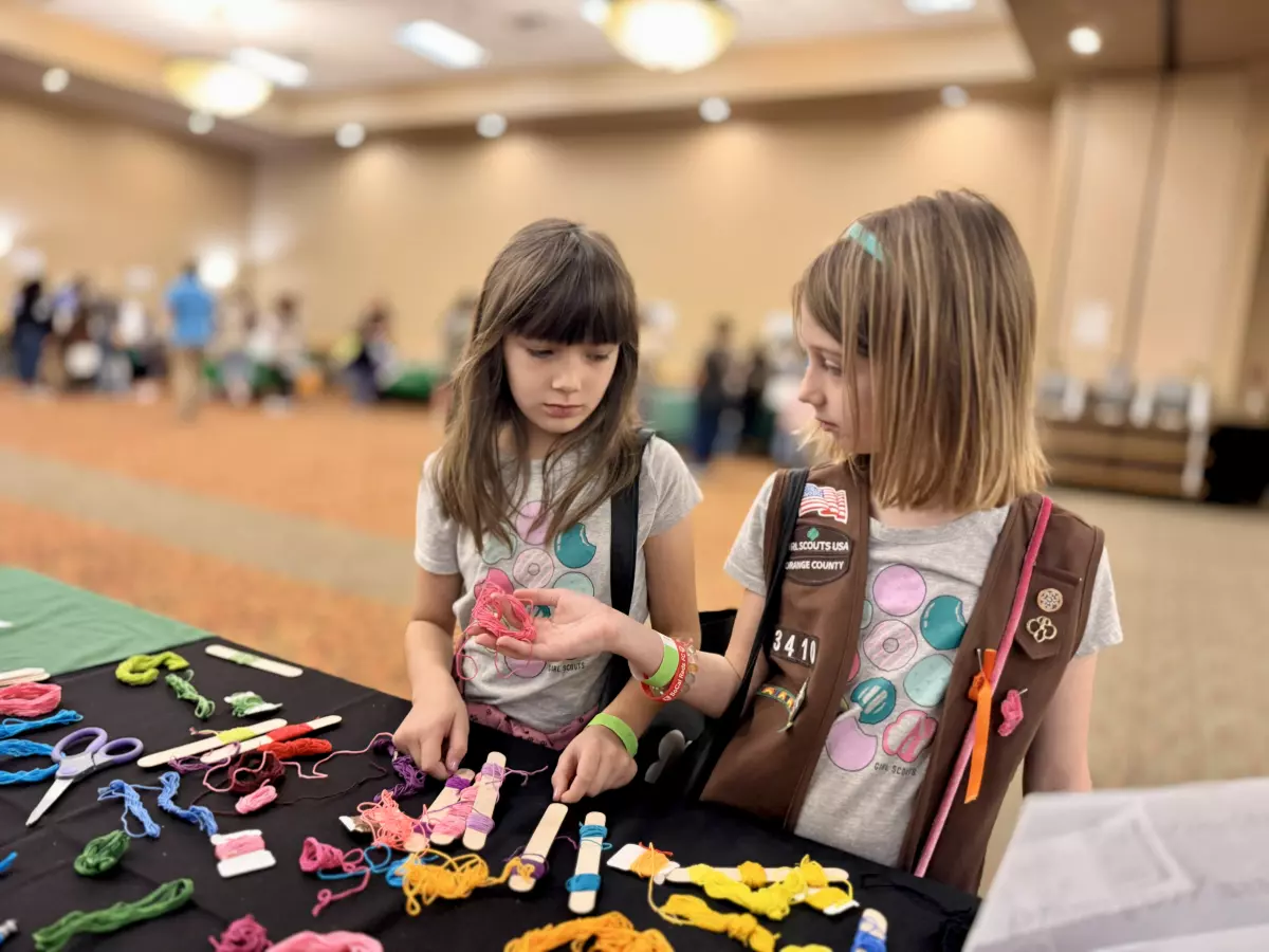 Girl Scouts examine crafting supplies at the Girl Scouts of Orange County Cookie Kickoff on Sunday. (Courtesy of Girl Scouts of Orange County)