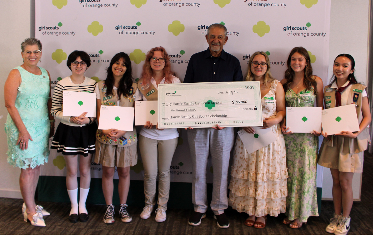 Girl Scouts of Orange County CEO Dr. Vikki Shepp, with Mohamed Hamir and six of the ten Class of 2026 Girl Scout recipients of the inaugural Hamir Family Scholarships
